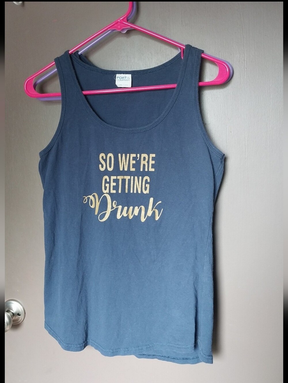 Two "So we're getting Drunk" tank tops